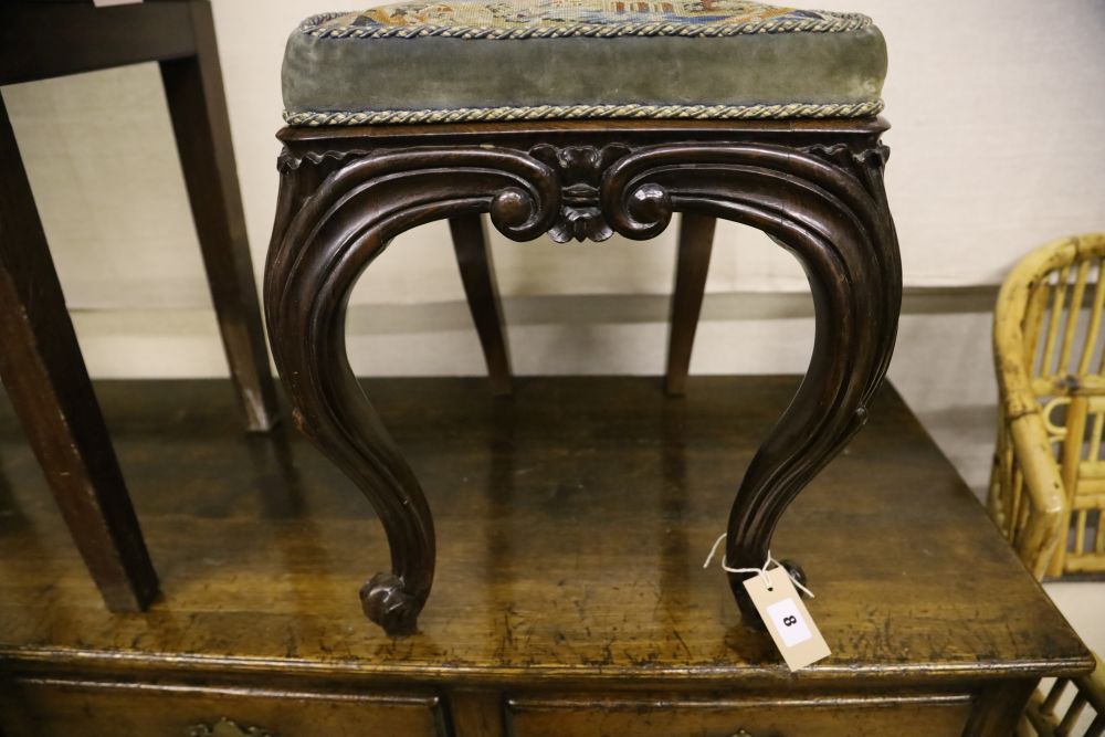 A Victorian mahogany hall seat with tapestry upholstery